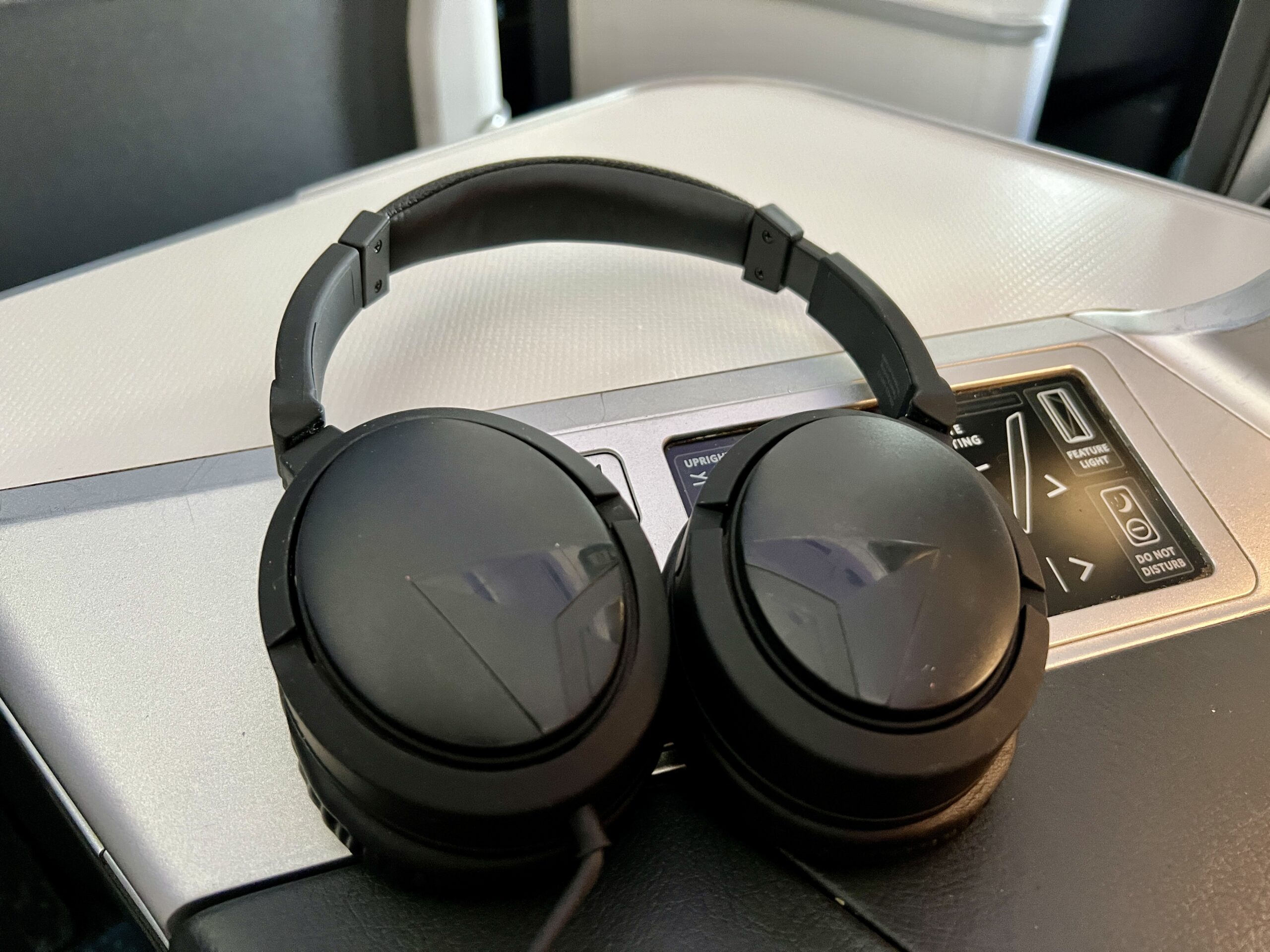 headphones sitting on a plane table