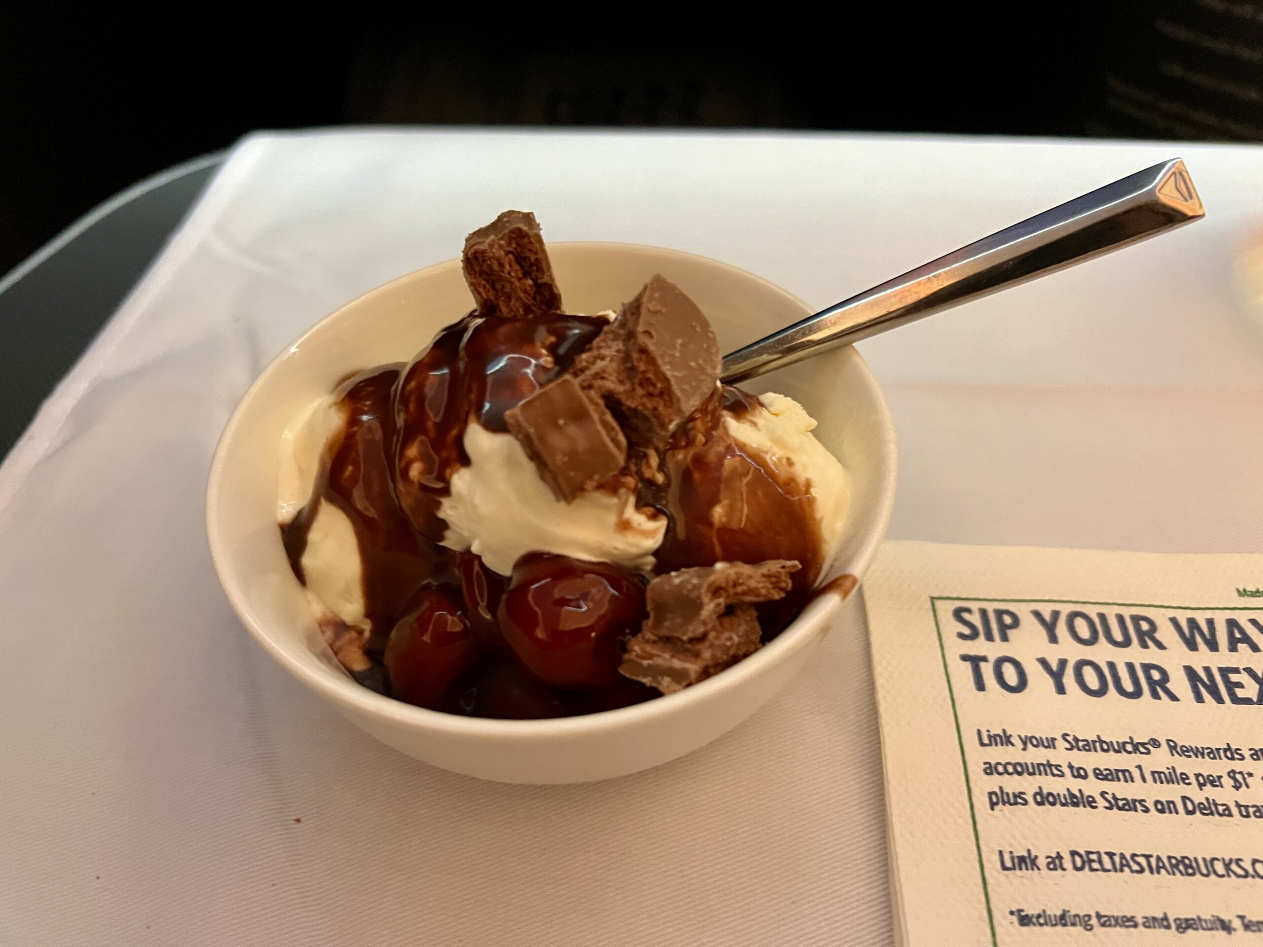 ice cream sundae in a bowl with chocolate topping