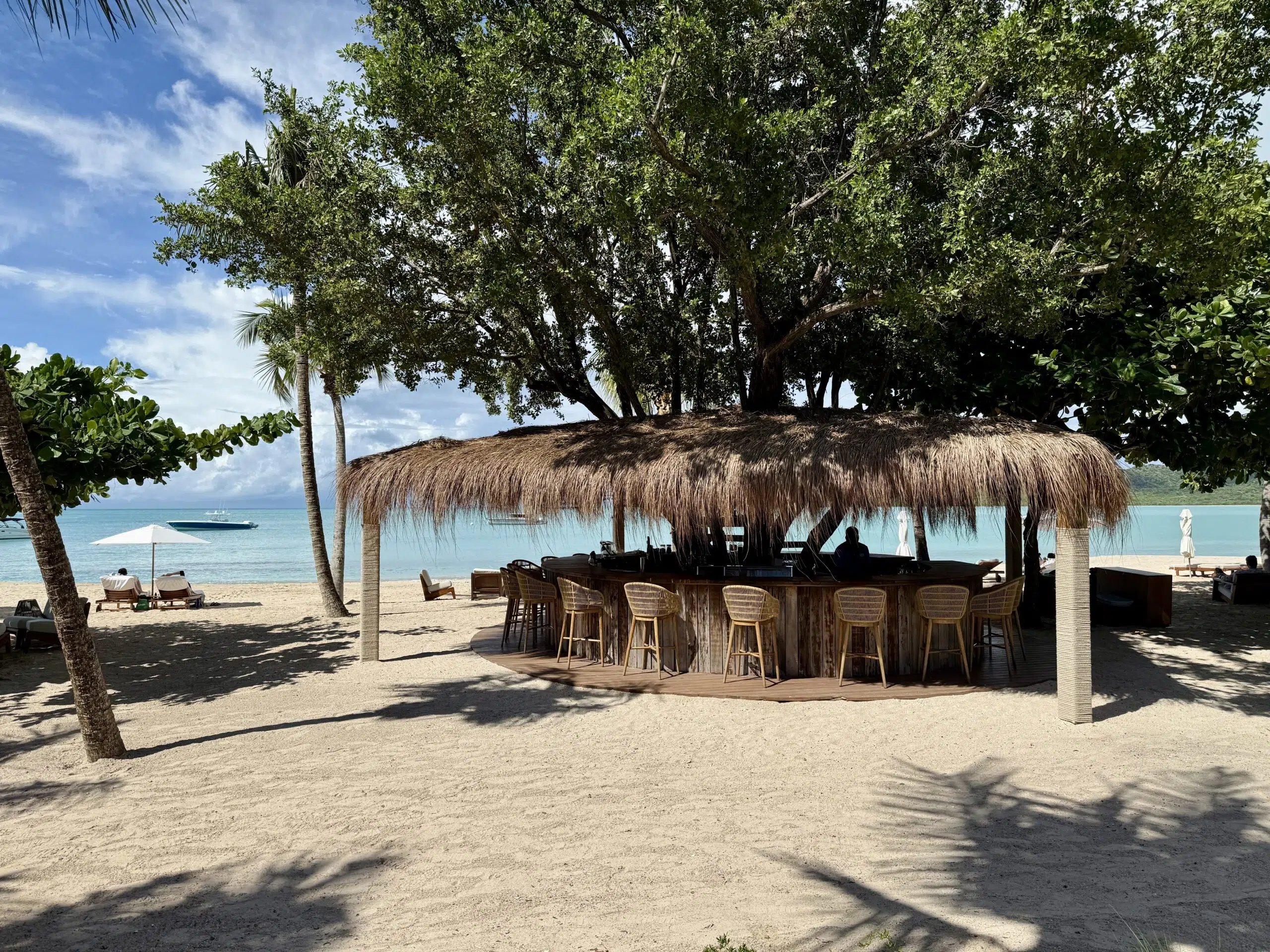 beach bar on the sand in front of the ocean