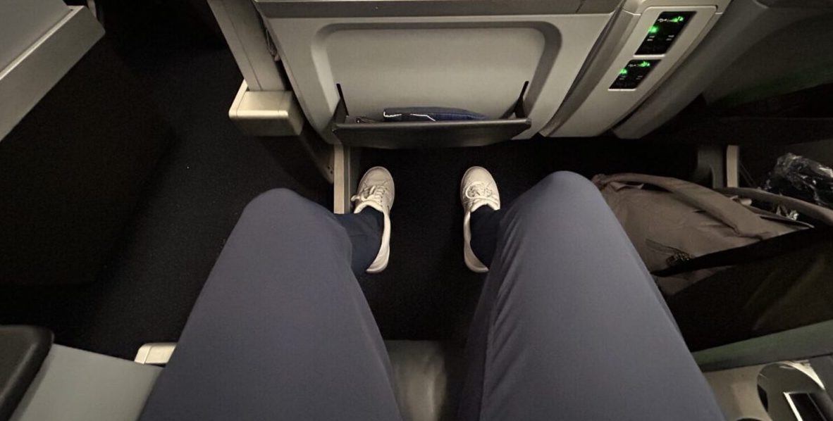 legs in an airplane seat