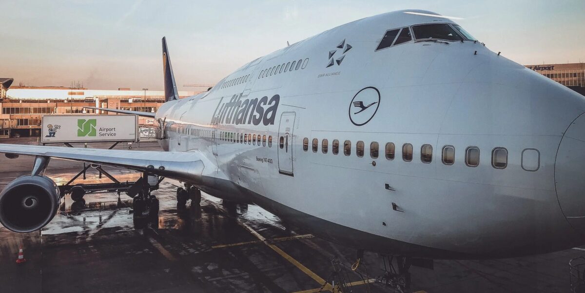 lufthansa 747 parked at gate