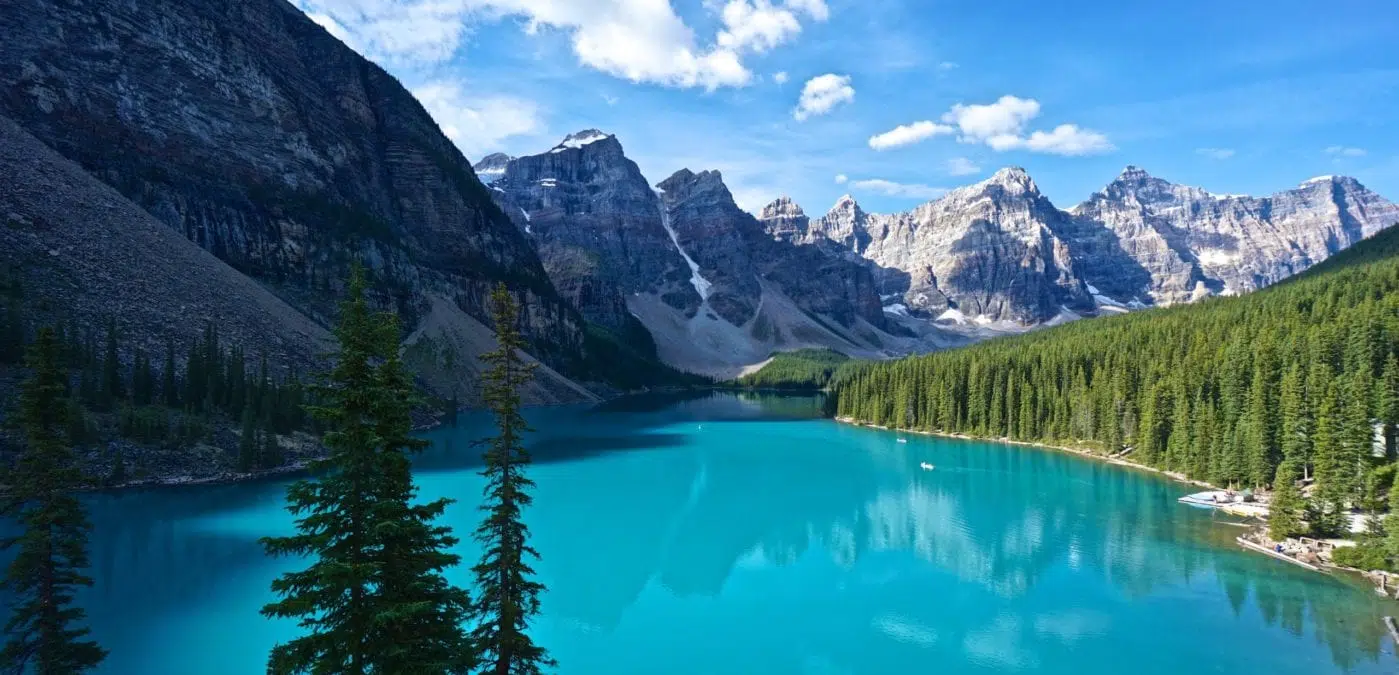 A lake with a mountain in the background