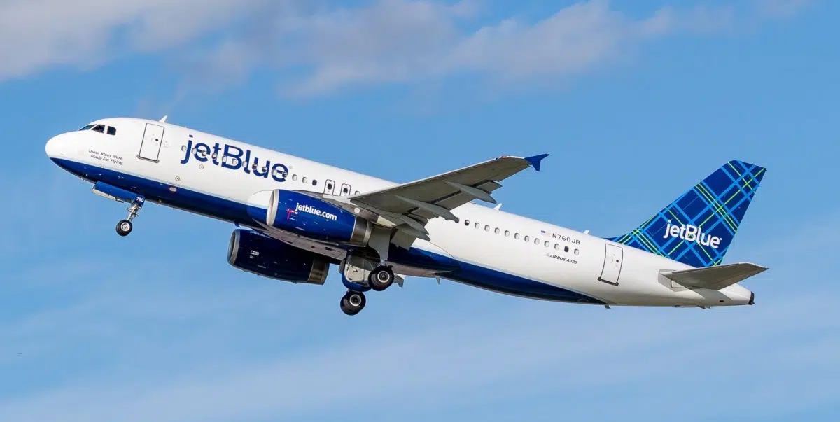 a jetblue plane flying