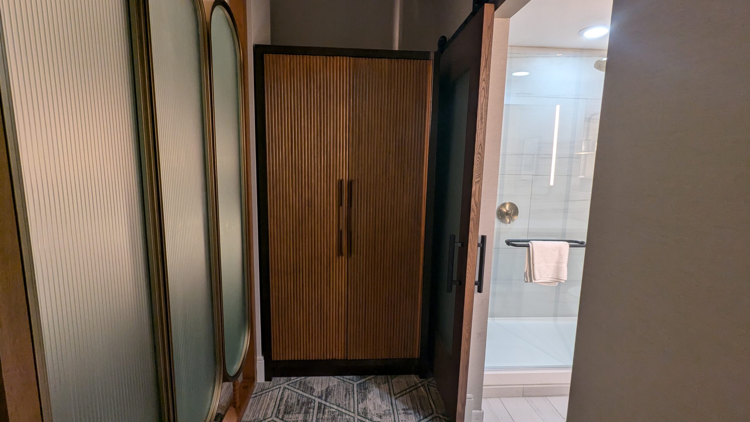 Hotel room wardrobe and door leading to the bathroom. 