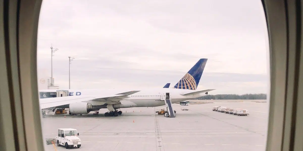 A large passenger jet sitting on top of a tarmac